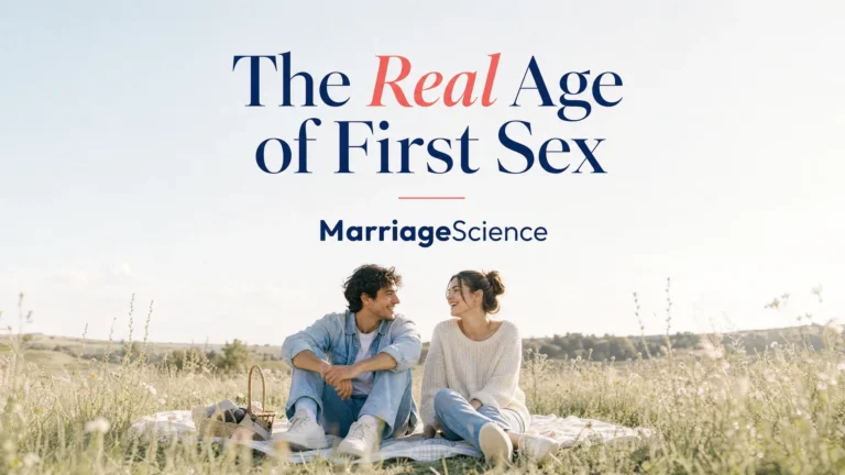 Two young adults laughing on a picnic blanket in a sunny meadow, under the headline The Real Age of First Sex